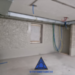 Cuvelage de mur en pierre contre infiltrations et humidité
