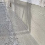 Etanchéité de pied de façade en résine bi-composante